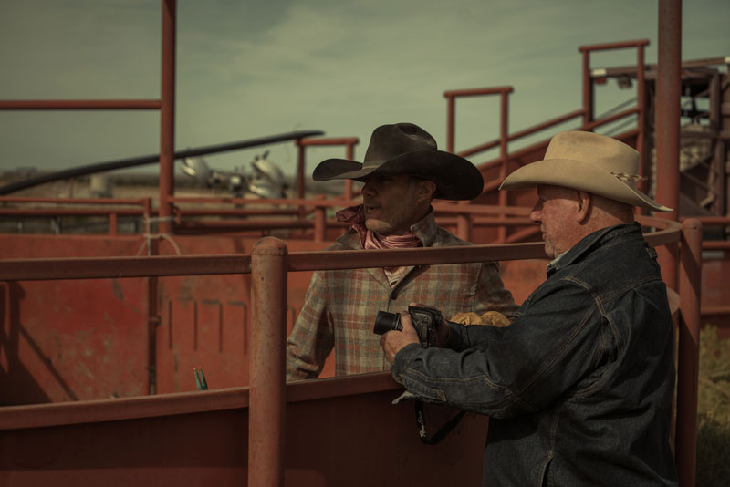 Phil Epp talking with cowboy